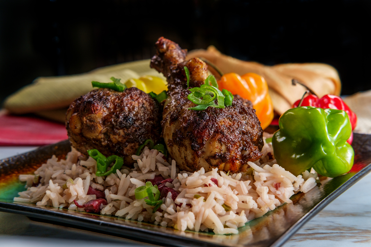 Authentic Jamaican jerk chicken with rice and peas and scotch bonnet peppers in Montego Bay