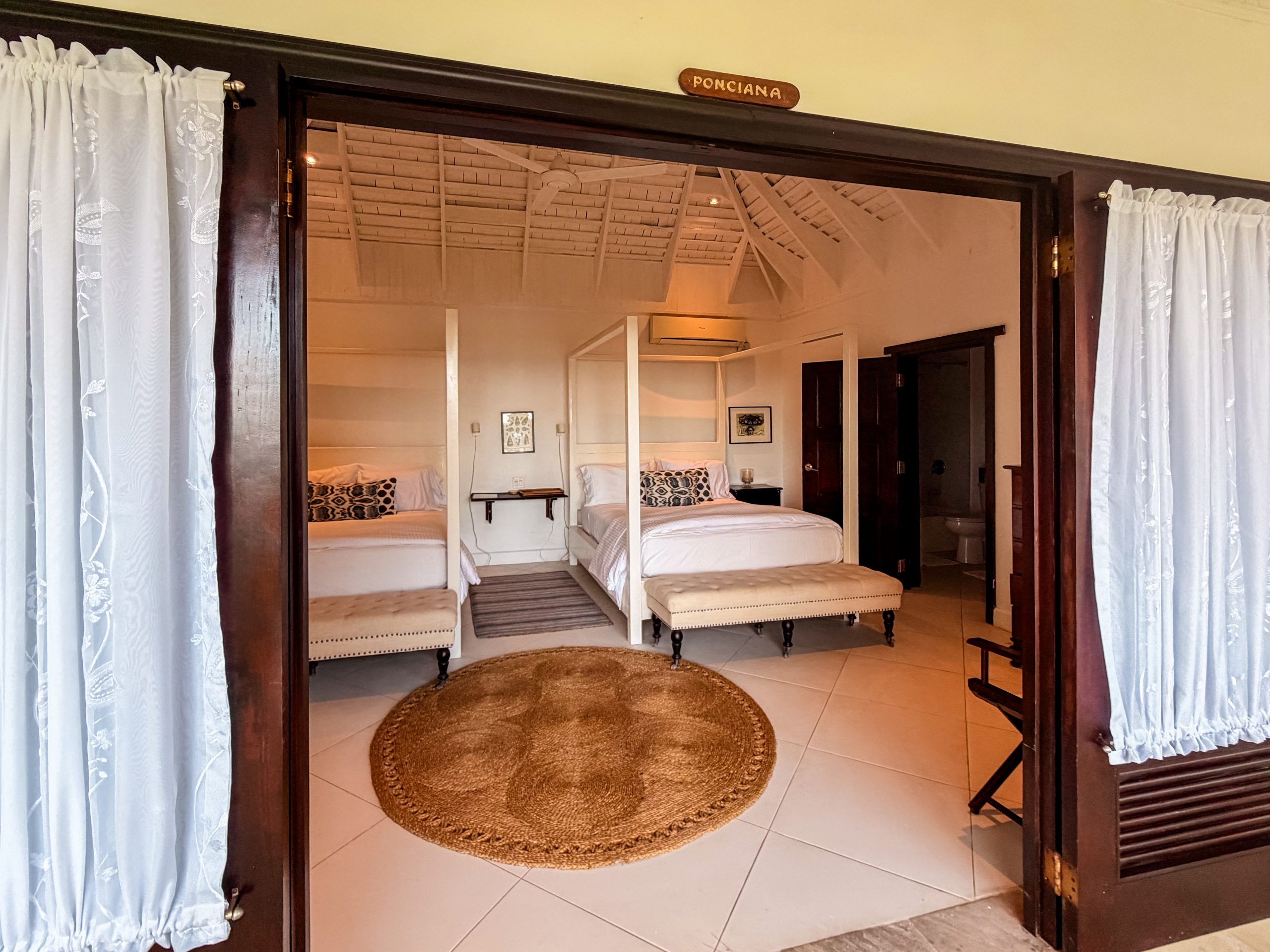 The Ponciana Suite at Coconut Cottage luxury villa in Montego Bay, Jamaica.
